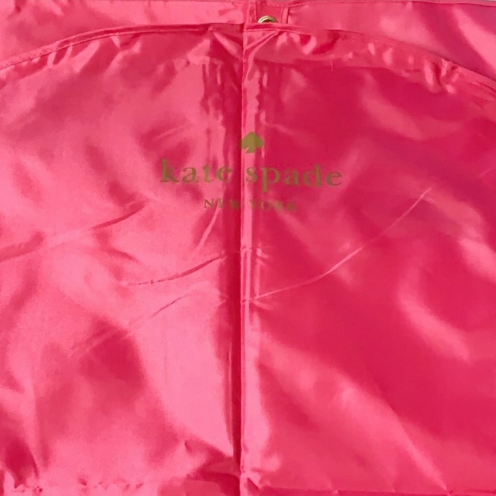 Kate Spade pink logo garment bag.